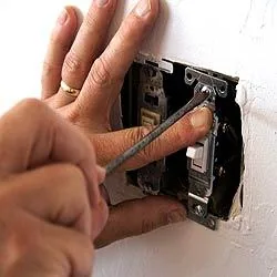 Electrical socket work pictured on the original A1 Electrical website
